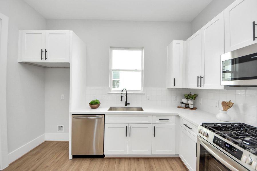 Furnished interior view inside a new home in Skyline Homes at Cavalcade, Houston (Image 28). Furnished interior view inside a new home in Skyline Homes at Cavalcade, Houston (Image 28).