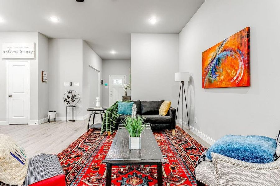 Living room featuring hardwood / wood-style flooring