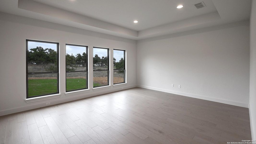 Spacious, unfurnished interior of a new home in The Preserve At Elm Creek 1 Acre, Canyon Lake (Image 15). Spacious, unfurnished interior of a new home in The Preserve At Elm Creek 1 Acre, Canyon Lake (Image 15).