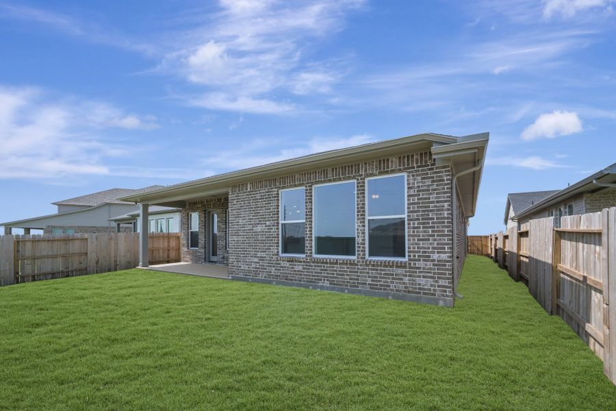 Exterior details and patio area of a home in The Grand Prairie - Retreat Collection, Hockley (Image 3).