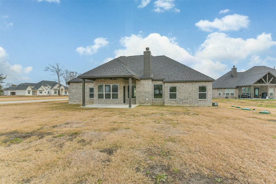 Exterior details and patio area of a home in , Baytown (Image 3).