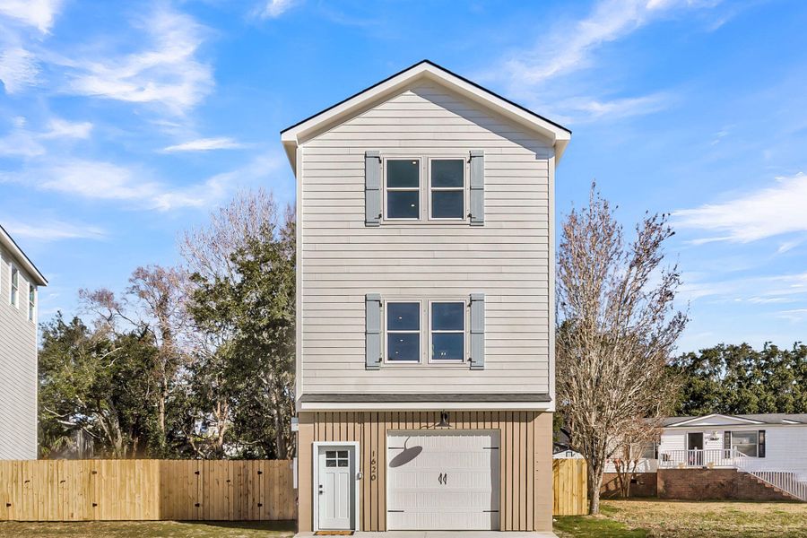 Front exterior of a new home in , Charleston, SC, highlighting curb appeal (Image 25).