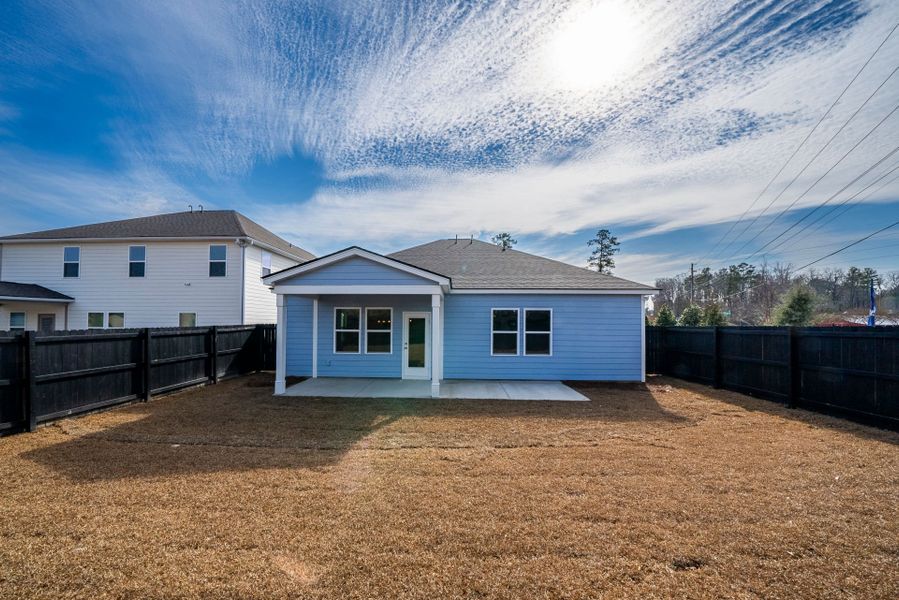 Exterior details and patio area of a home in Monroe Preserve, Chapin (Image 34).