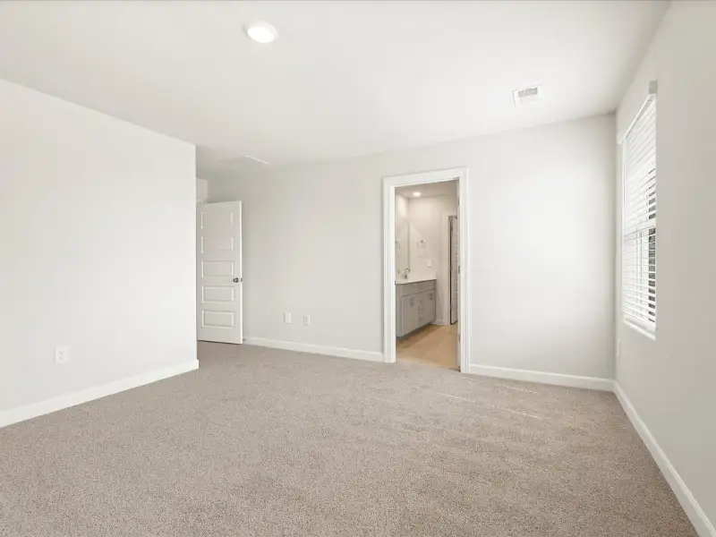 Spacious, unfurnished interior of a new home in Brayfield Manor - Heritage Collection, Wellford (Image 9).
