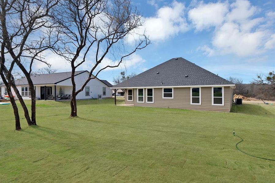 Exterior details and patio area of a home in , Runaway Bay (Image 4). Exterior details and patio area of a home in , Runaway Bay (Image 4).