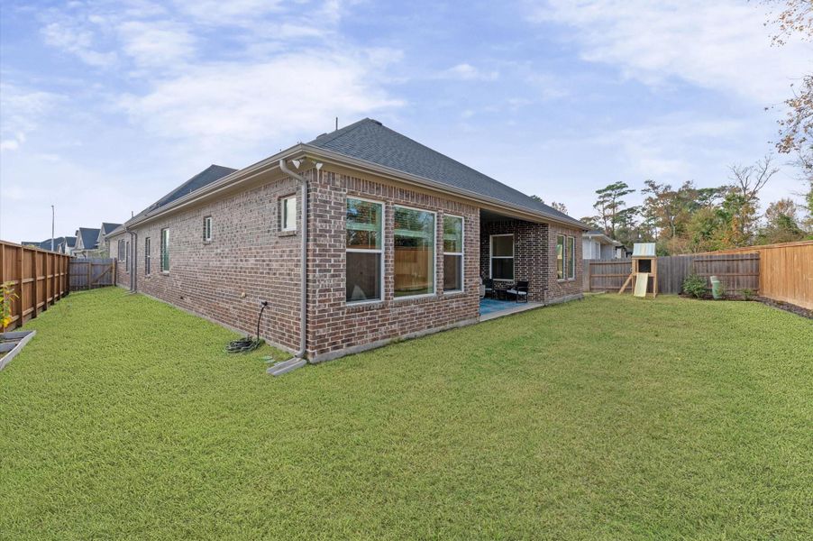 Exterior details and patio area of a home in , Tomball (Image 25).