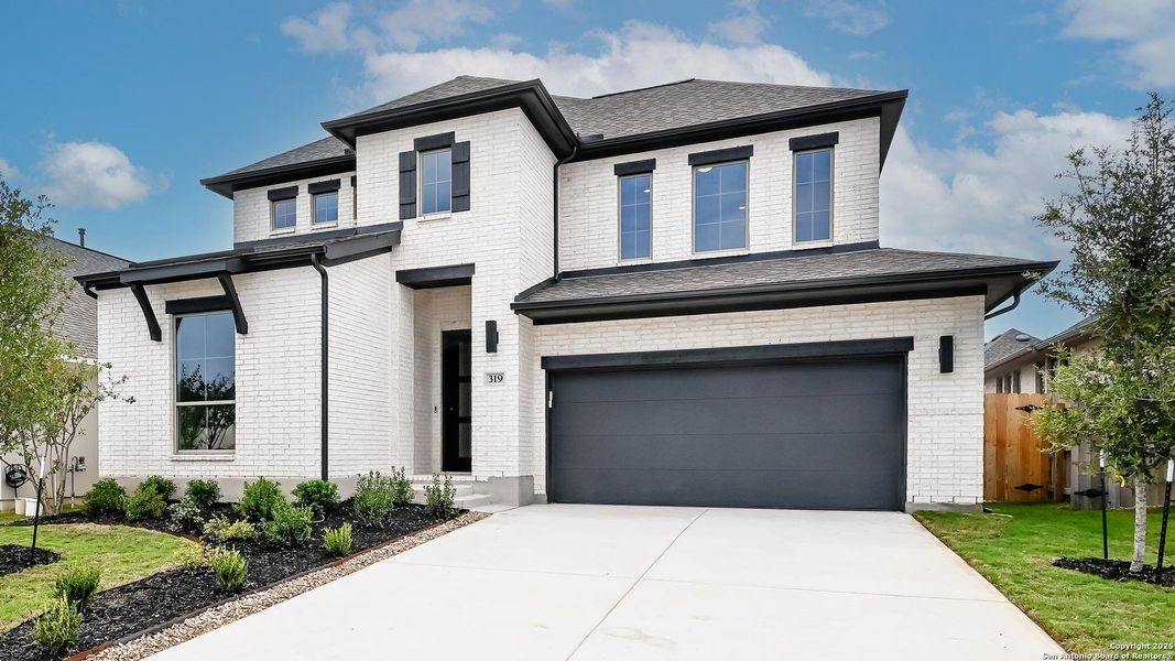 Front exterior of a new home in Legacy At Lake Dunlap 50', New Braunfels, TX, highlighting curb appeal (Image 2). Front exterior of a new home in Legacy At Lake Dunlap 50', New Braunfels, TX, highlighting curb appeal (Image 2).