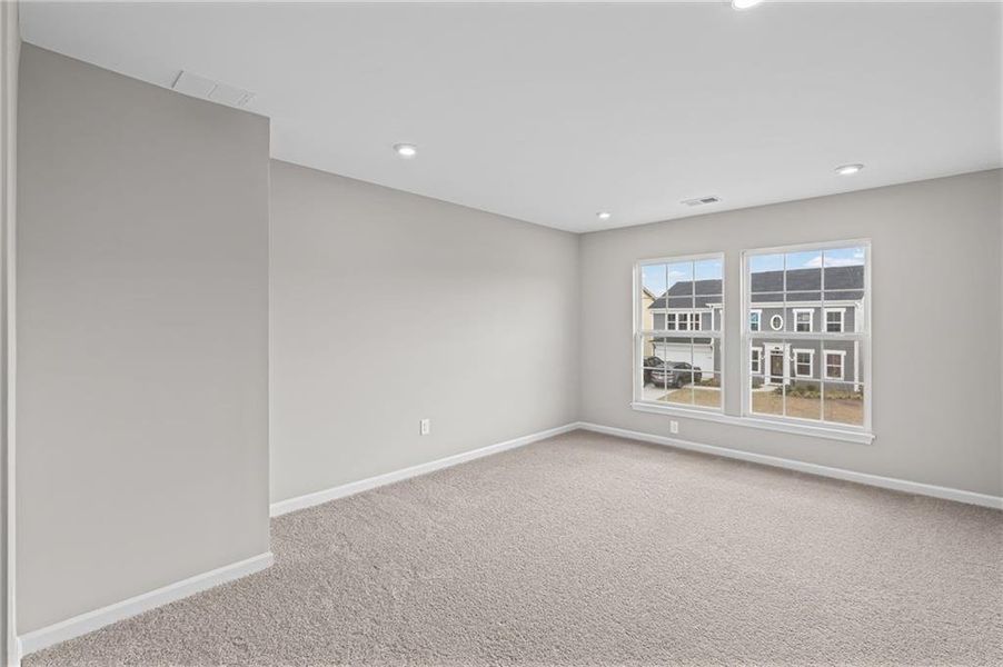 Spacious, unfurnished interior of a new home in The Reserve At Liberty Park, Braselton (Image 34).