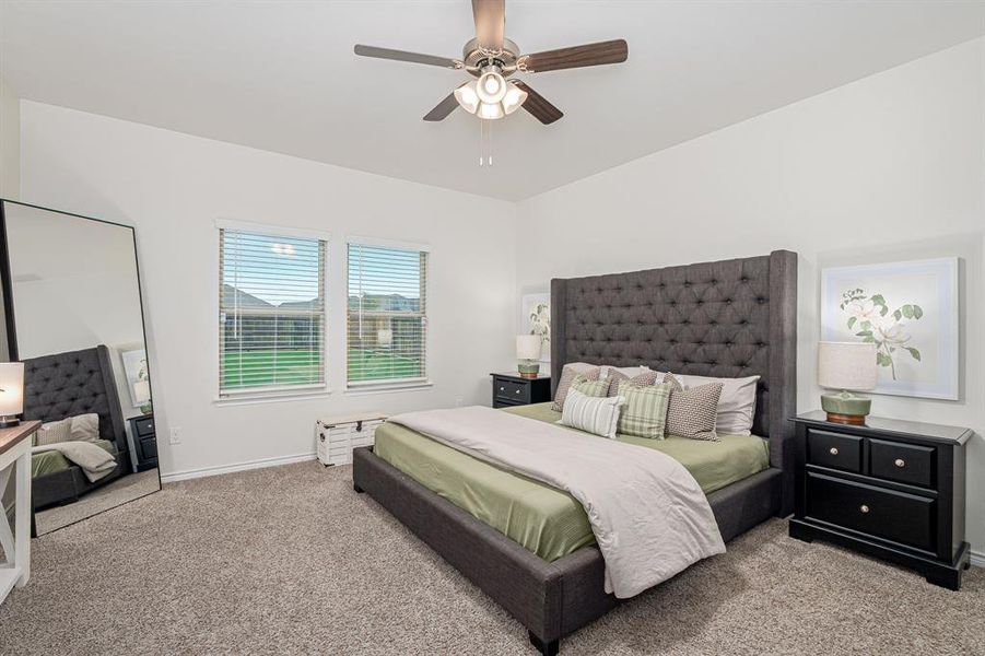 Oversized primary with views to the pool-sized back yard!