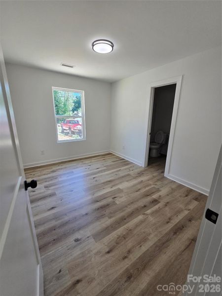 Spacious, unfurnished interior of a new home in , New London (Image 10).