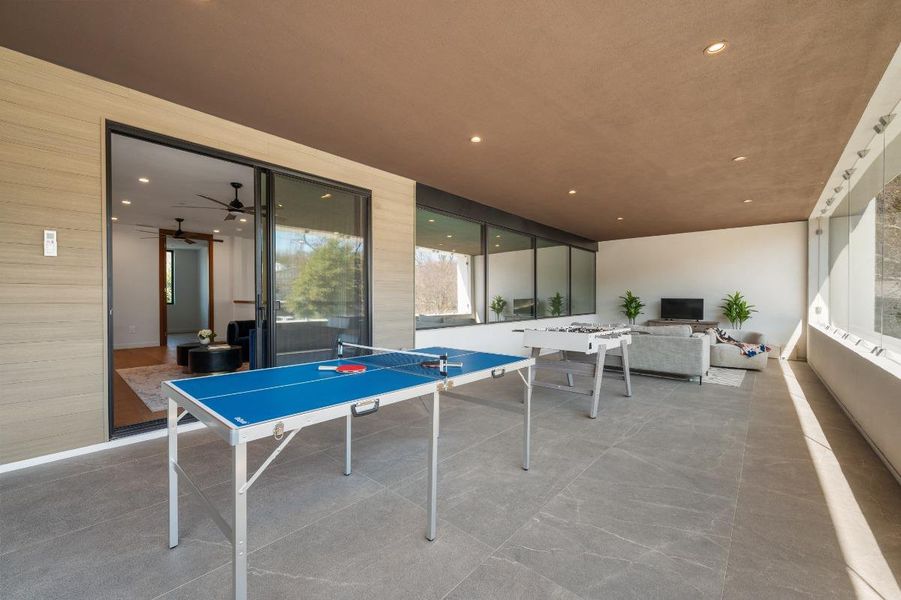 Game room with a ceiling fan and recessed lighting Game room with a ceiling fan and recessed lighting