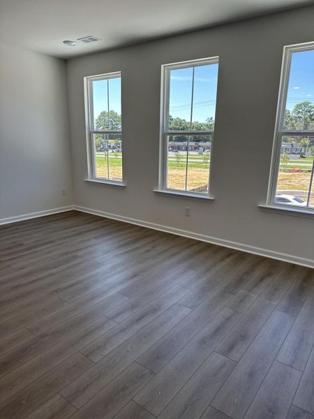 Spacious, unfurnished interior of a new home in Clear Springs Townhomes, North Charleston (Image 8).