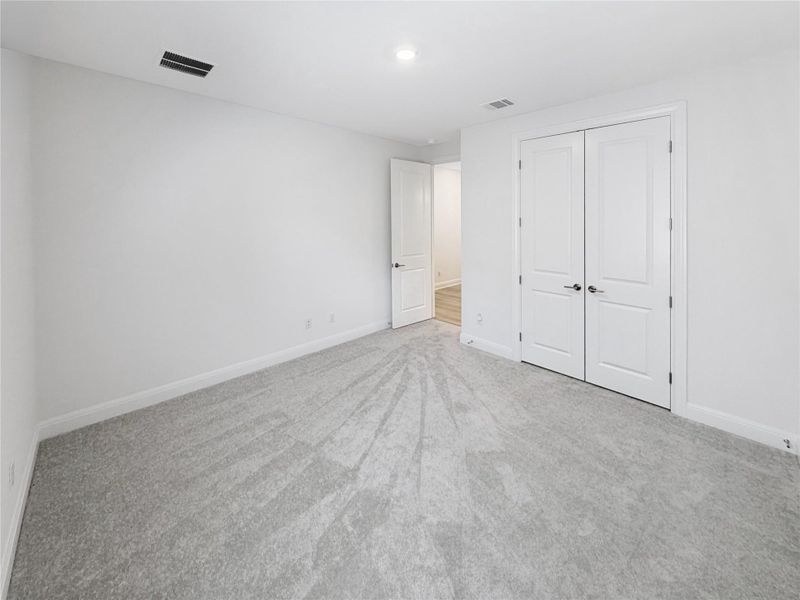 Bedroom 4 empty and unstaged