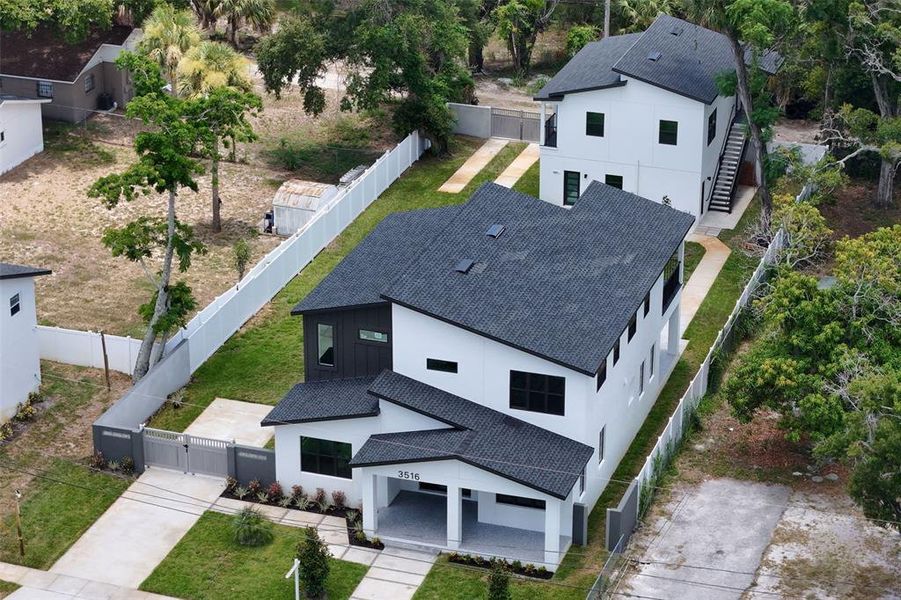 Front exterior of a new home in , St. Petersburg, FL, highlighting curb appeal (Image 29). Front exterior of a new home in , St. Petersburg, FL, highlighting curb appeal (Image 29).