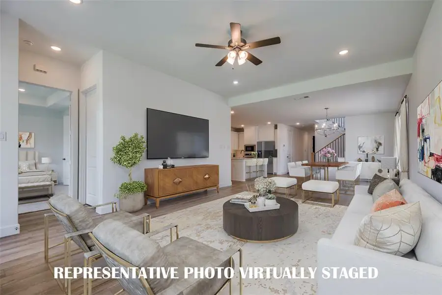 Our gorgeous Marseille floor plan offers enough space to entertain a crowd!  REPRESENTATIVE PHOTO VIRTUALLY STAGED