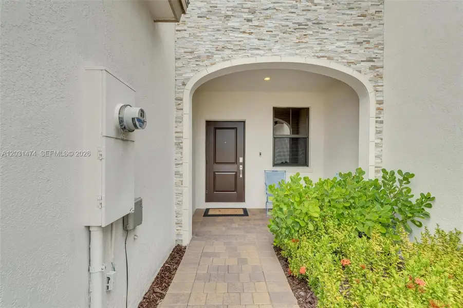Exterior details and patio area of a home in , Miami (Image 3).