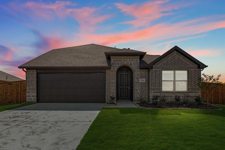 Front exterior of a new home in East Oak Creek Elements, Commerce, TX, highlighting curb appeal (Image 2).