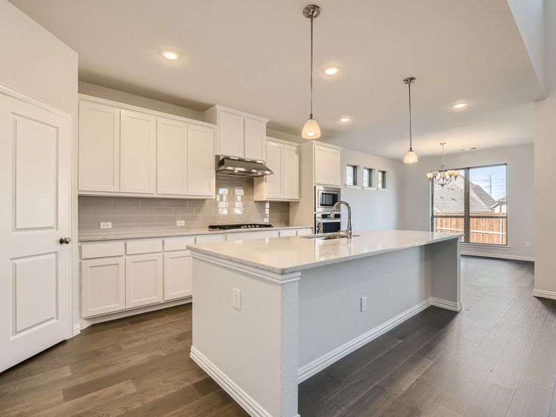 Plan 1533 Kitchen Representative Photo by American Legend Homes