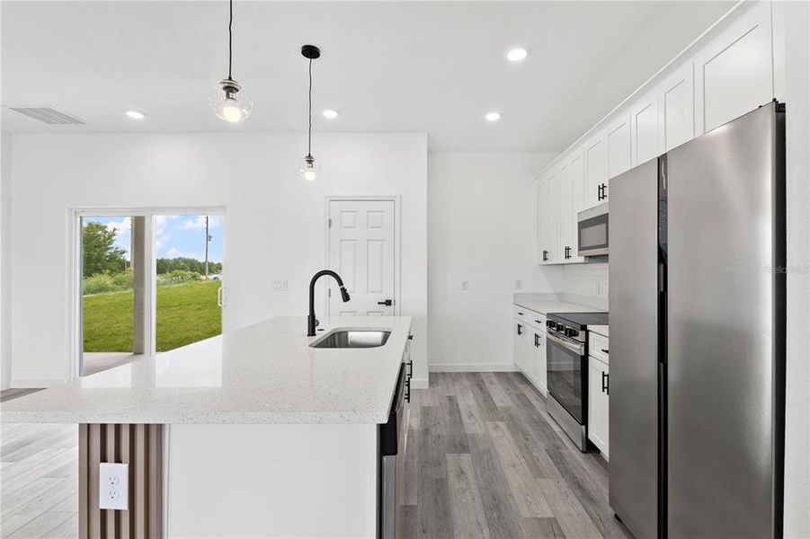 Furnished interior view inside a new home in , Poinciana (Image 5). Furnished interior view inside a new home in , Poinciana (Image 5).