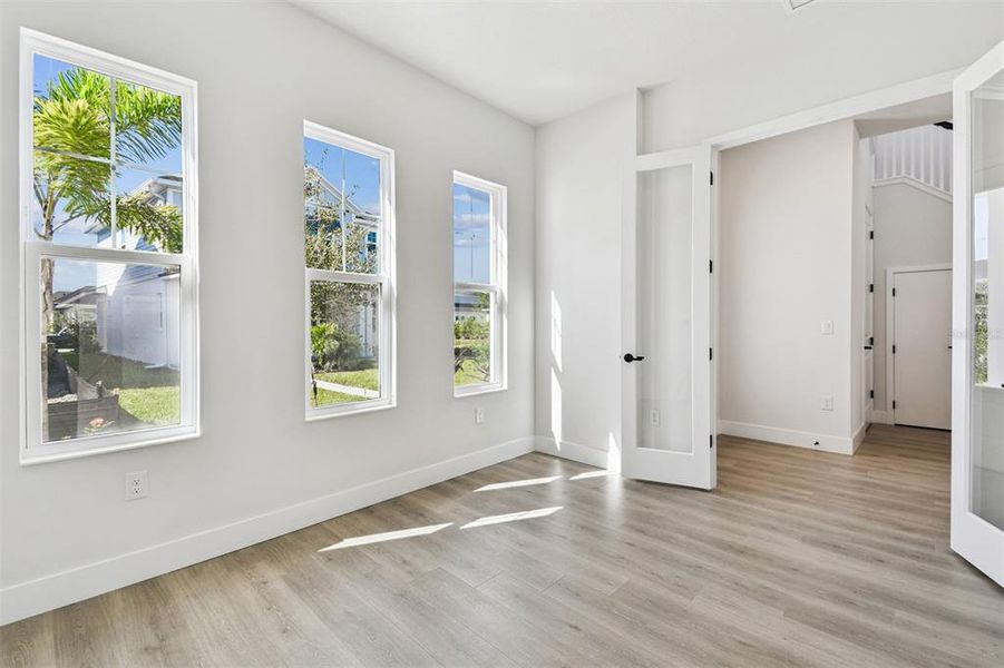 Spacious, unfurnished interior of a new home in Emerald Landing at Waterside at Lakewood Ranch – Cottage Series, Sarasota (Image 27).