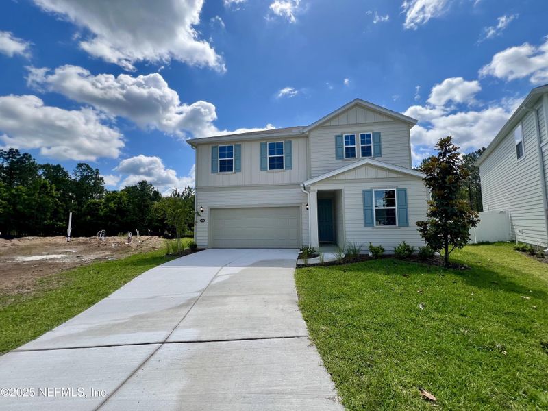 Front exterior of a new home in , Jacksonville, FL, highlighting curb appeal (Image 1). Front exterior of a new home in , Jacksonville, FL, highlighting curb appeal (Image 1).