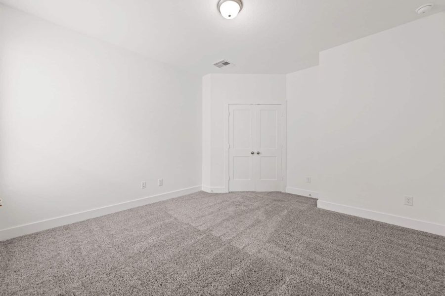 Representative unfurnished interior of a home built from the Rivers 60′ Lot by Chesmar Homes in Fulshear Lakes, Fulshear (Image 30).