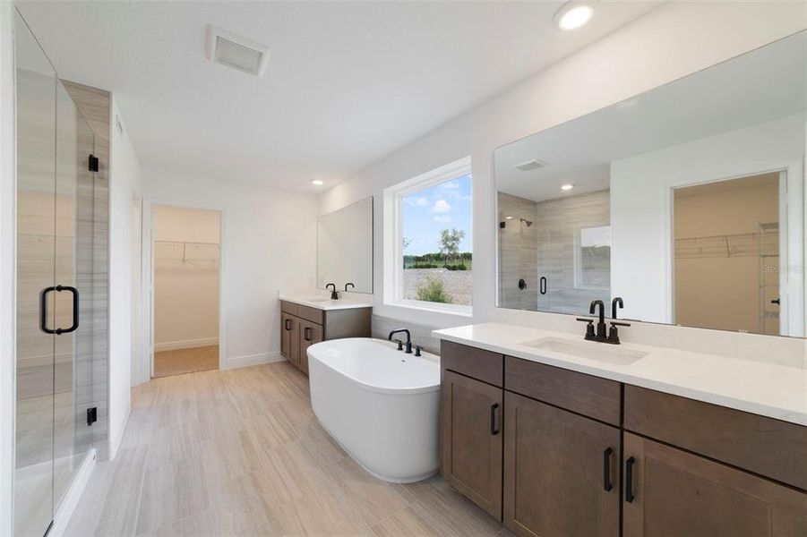 Furnished interior view inside a new home in Vintner Reserve, Clermont (Image 6).