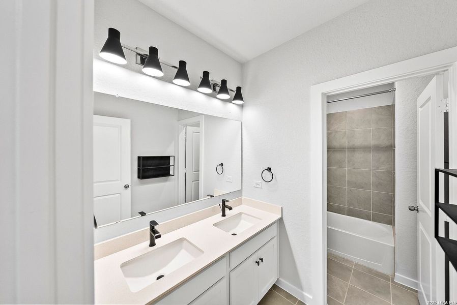 Furnished interior view inside a new home in Davis Ranch 60', San Antonio (Image 15).