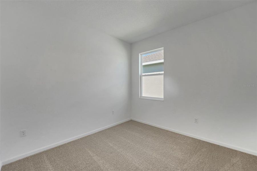 Spacious, unfurnished interior of a new home in Willowbrook North, Winter Haven (Image 31).