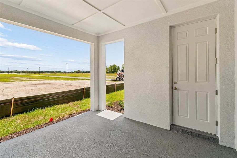 Exterior details and patio area of a home in Palmeras at Crossprairie – The Magnolia Collection, St. Cloud (Image 3).