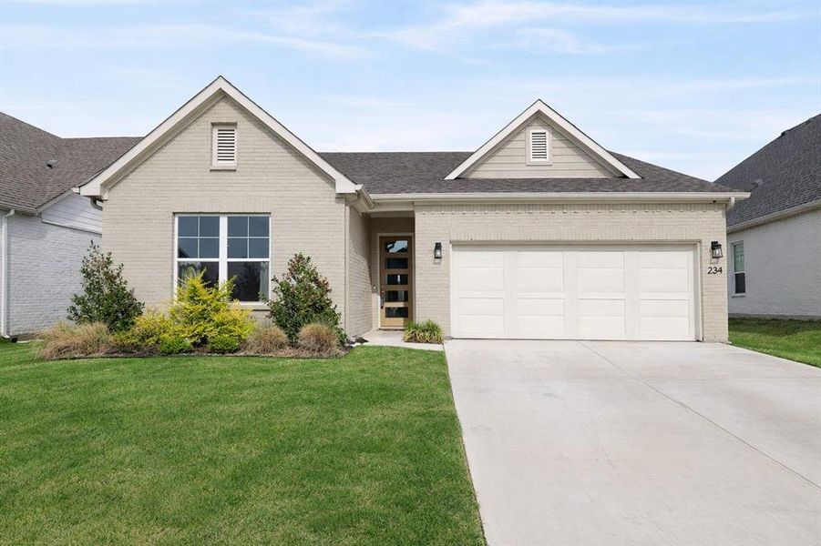Front exterior of a new home in , Aledo, TX, highlighting curb appeal (Image 21).