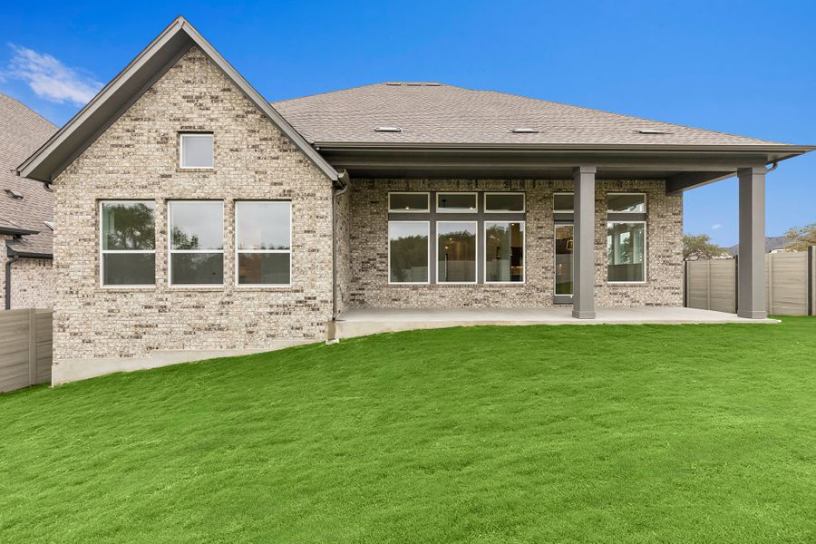 Exterior details and patio area of a home in Wolf Ranch – West Bend, Georgetown (Image 3).