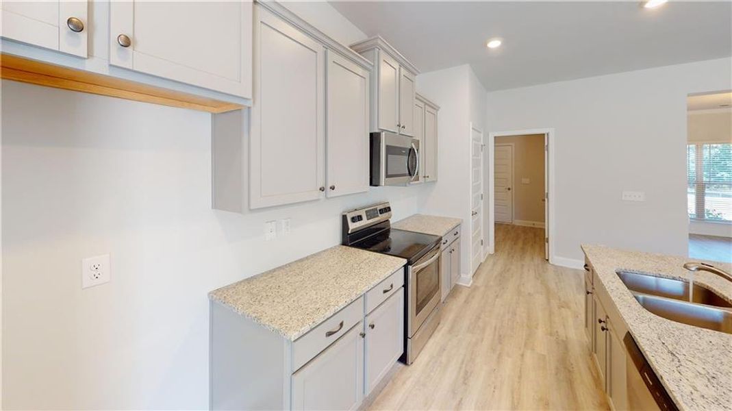 Furnished interior view inside a new home in Holliday Pass, Griffin (Image 5).