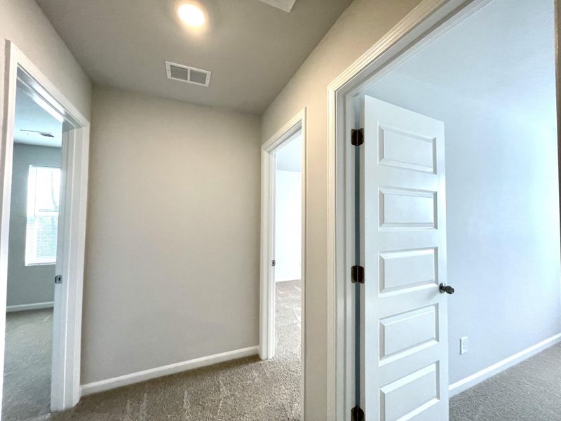 Spacious, unfurnished interior of a new home in Lindera Preserve at Cane Bay Plantation, Summerville (Image 17). Spacious, unfurnished interior of a new home in Lindera Preserve at Cane Bay Plantation, Summerville (Image 17).