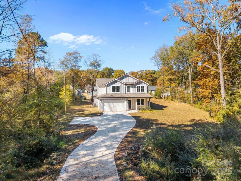 Front exterior of a new home in , Monroe, NC, highlighting curb appeal (Image 2).