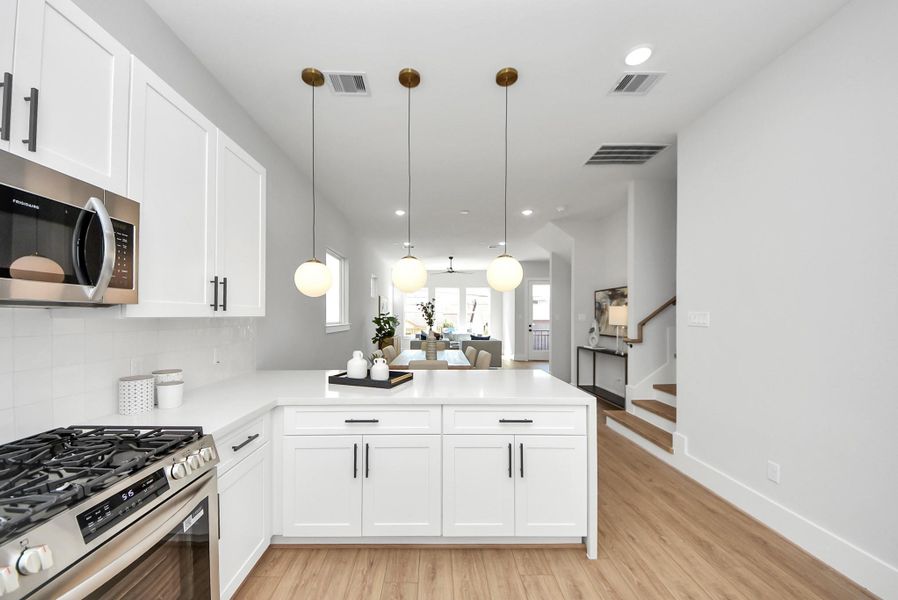 Furnished interior view inside a new home in Skyline Homes at Cavalcade, Houston (Image 30). Furnished interior view inside a new home in Skyline Homes at Cavalcade, Houston (Image 30).