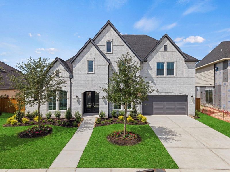 Front exterior of a new home in Dunham Pointe, Cypress, TX, highlighting curb appeal (Image 23).