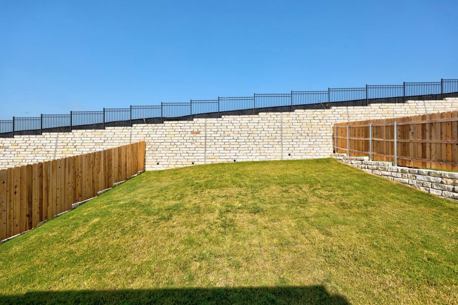 Exterior details and patio area of a home in Lakeside at Tessera, Lago Vista (Image 22).