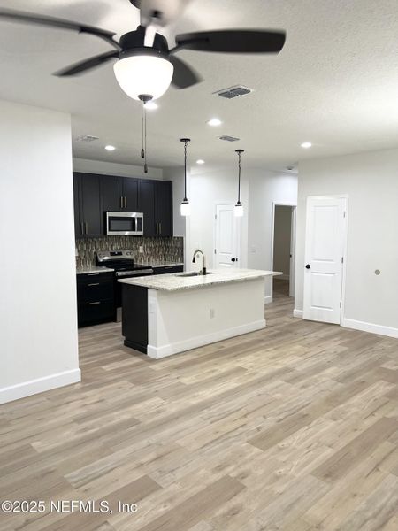 Furnished interior view inside a new home in , Jacksonville (Image 10).