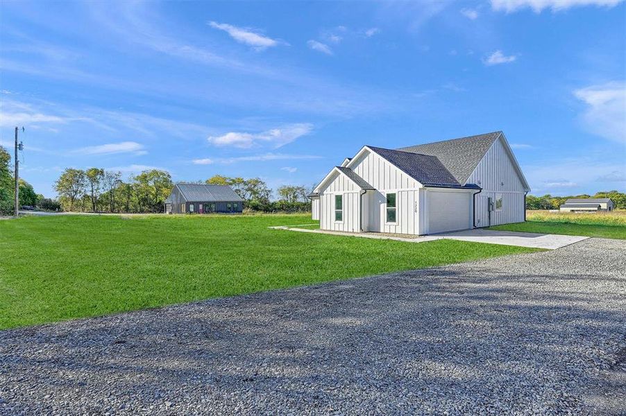Exterior details and patio area of a home in , Savoy (Image 28). Exterior details and patio area of a home in , Savoy (Image 28).