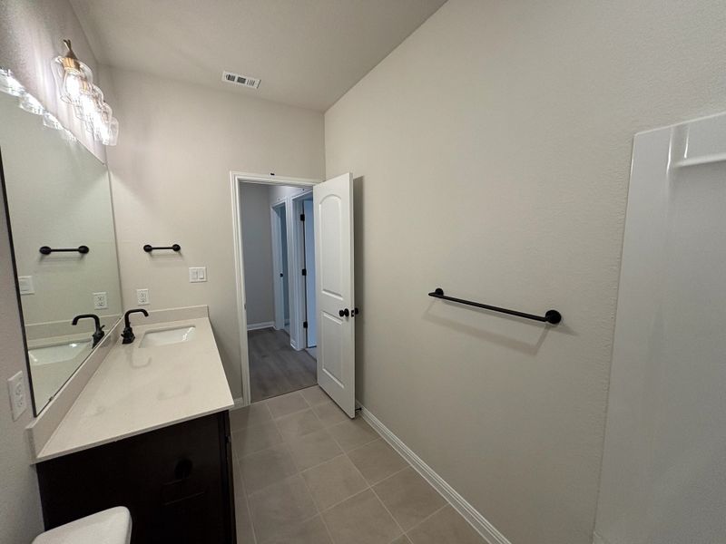 Furnished interior view inside a new home in Cannon Ranch 45s, Dripping Springs (Image 11).