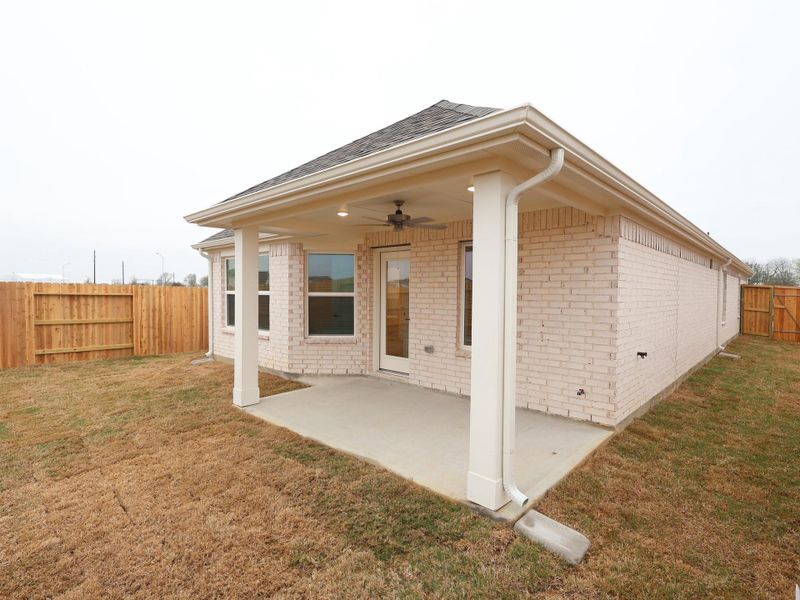 Exterior details and patio area of a home in Wildrye, Waller (Image 20).