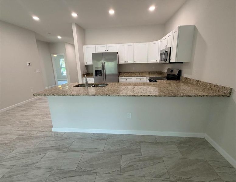 Furnished interior view inside a new home in , Port Charlotte (Image 10). Furnished interior view inside a new home in , Port Charlotte (Image 10).