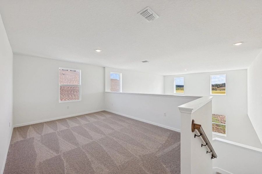 Spacious, unfurnished interior of a new home in Northlake at Ovation, Winter Garden (Image 30).