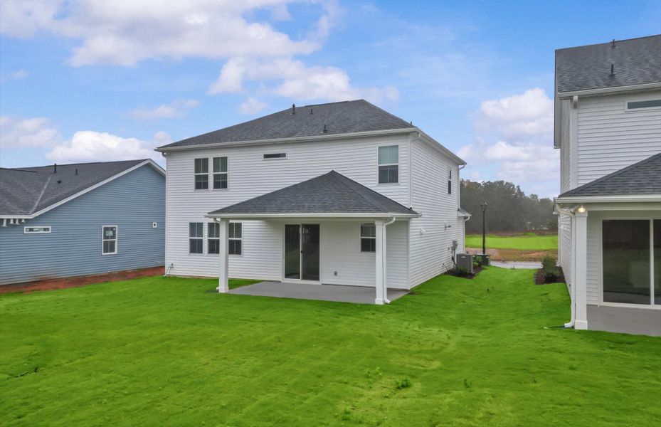 Exterior details and patio area of a home in Fox Hollow, Spartanburg (Image 4).