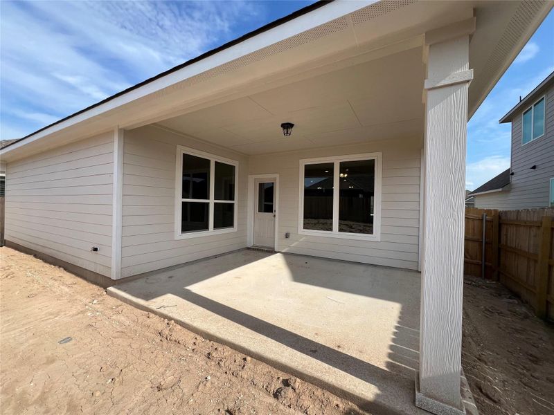Back of property featuring a patio area Back of property featuring a patio area