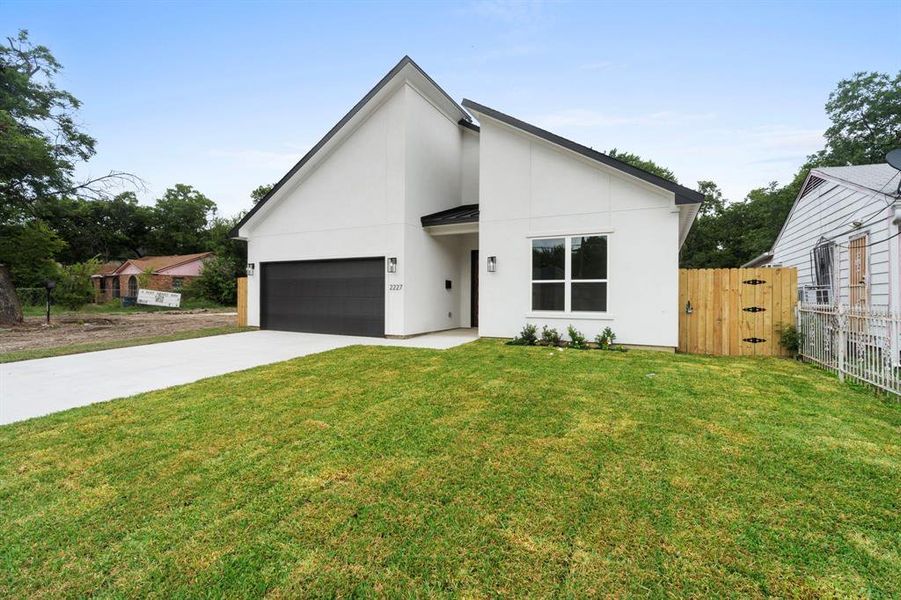 Front exterior of a new home in , Dallas, TX, highlighting curb appeal (Image 2). Front exterior of a new home in , Dallas, TX, highlighting curb appeal (Image 2).