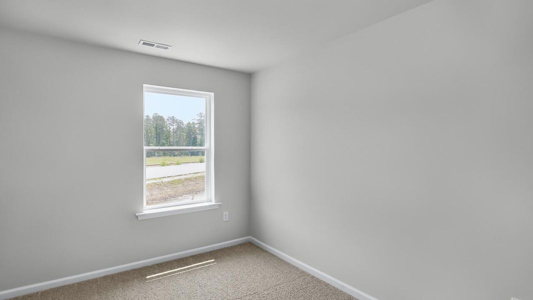 Spacious, unfurnished interior of a new home in Townes at Seabrooke, Leland (Image 26).