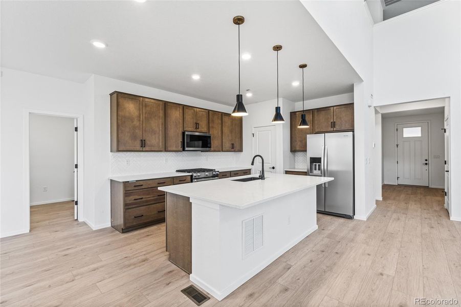 Furnished interior view inside a new home in Harvest Crossing, Aurora (Image 15).