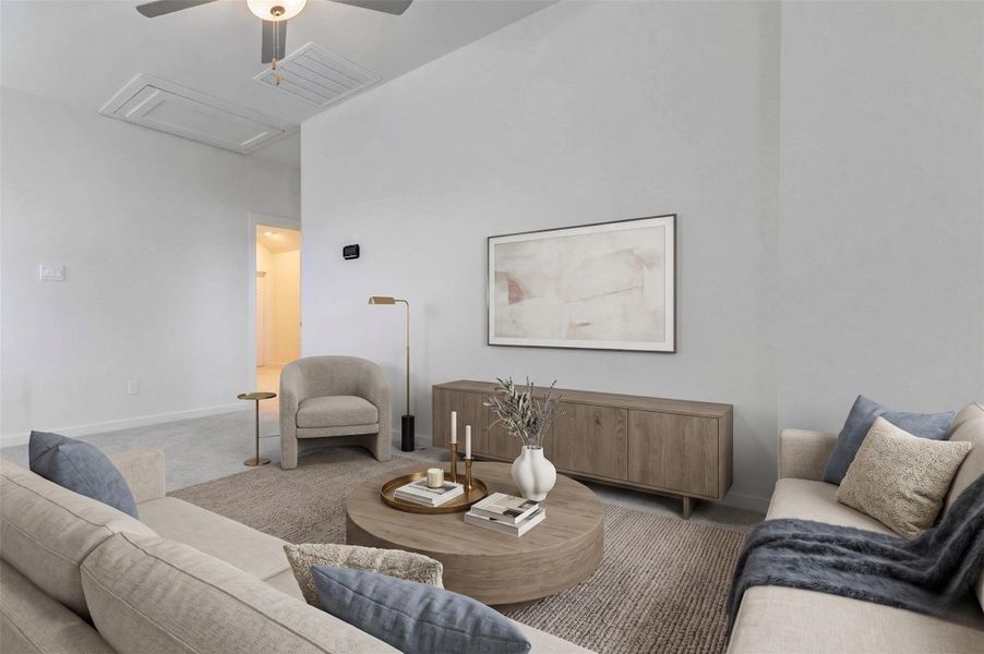 Spacious secondary bedroom with soft carpet, neutral walls, ceiling fan, and a clean open layout ready for personal style. The room offers flexibility for a guest suite, child’s room, office, or hobby space, with easy access to the hallway and a bright, comfortable feel.